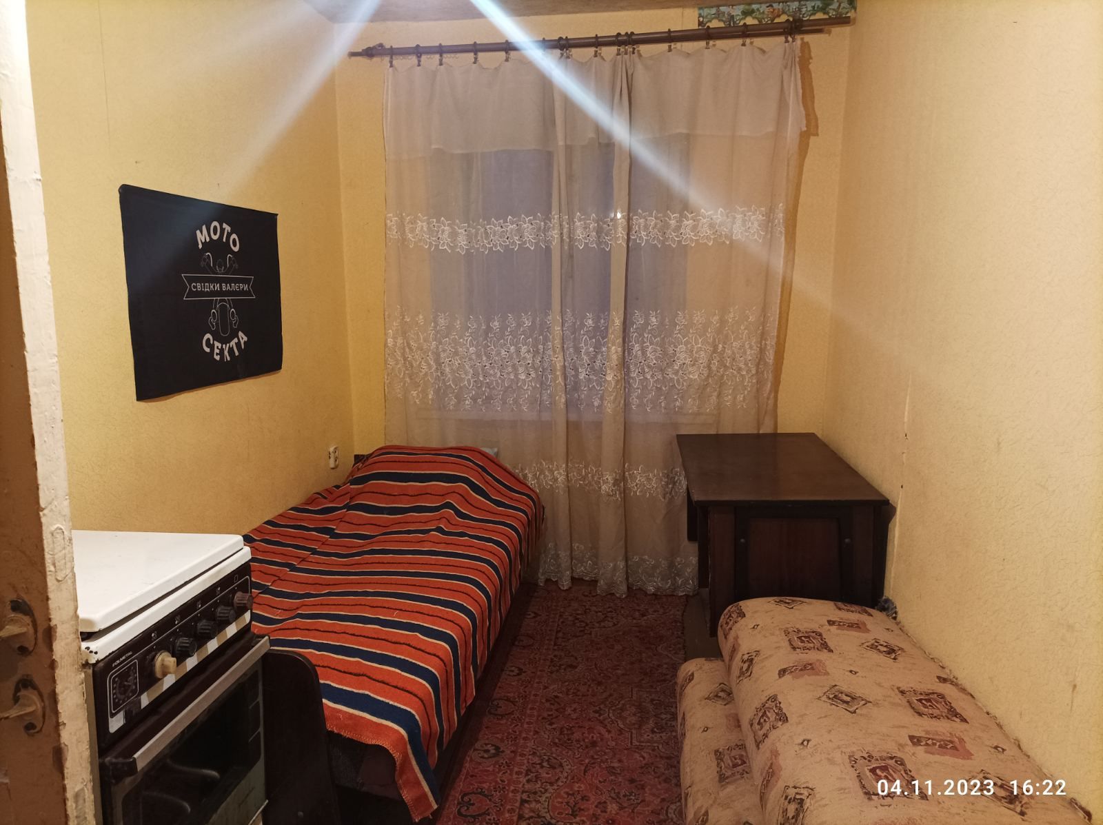 Two-room apartment with hot water in city center