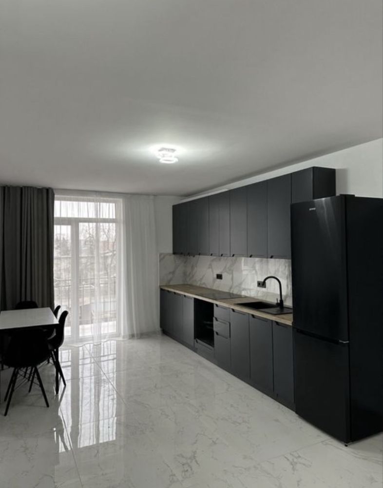 Modern 1-Room Apartment with Panoramic Windows and Balcony