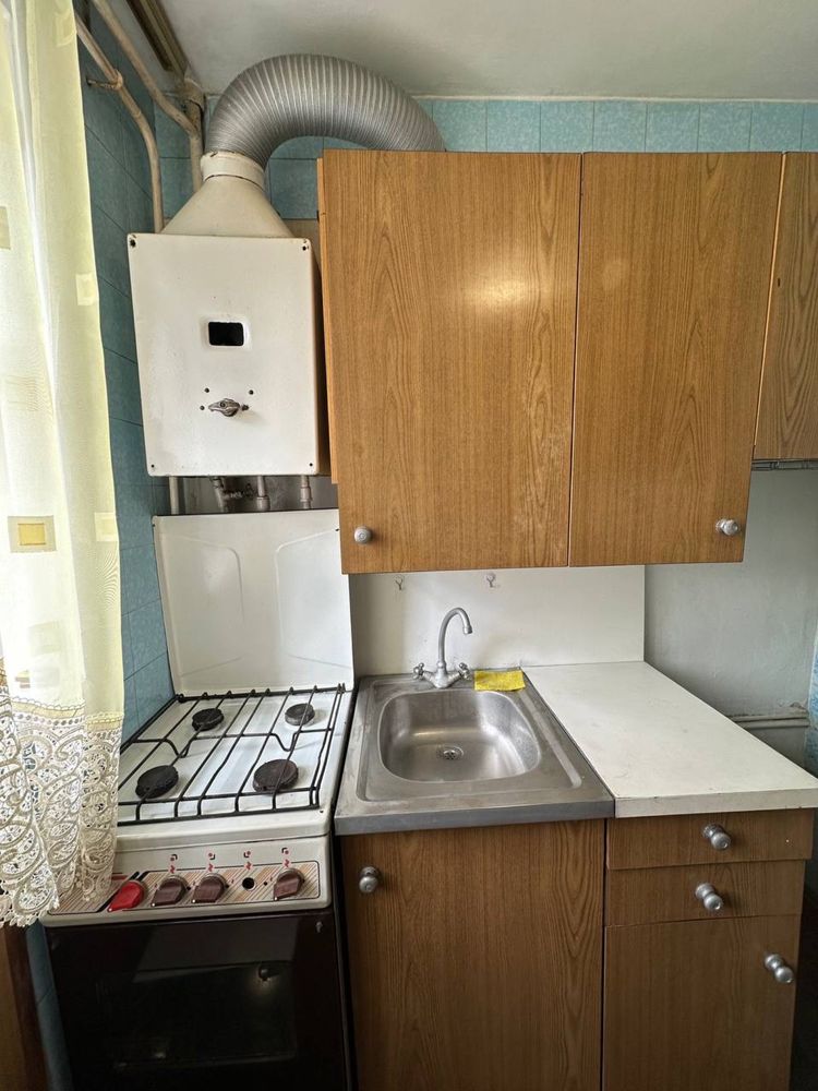 Furnished One-Bedroom Apartment with Kitchen and Balcony