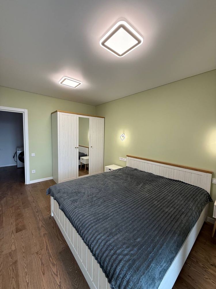 Two-level 2-room apartment with large kitchen-living room in Safe Town Complex