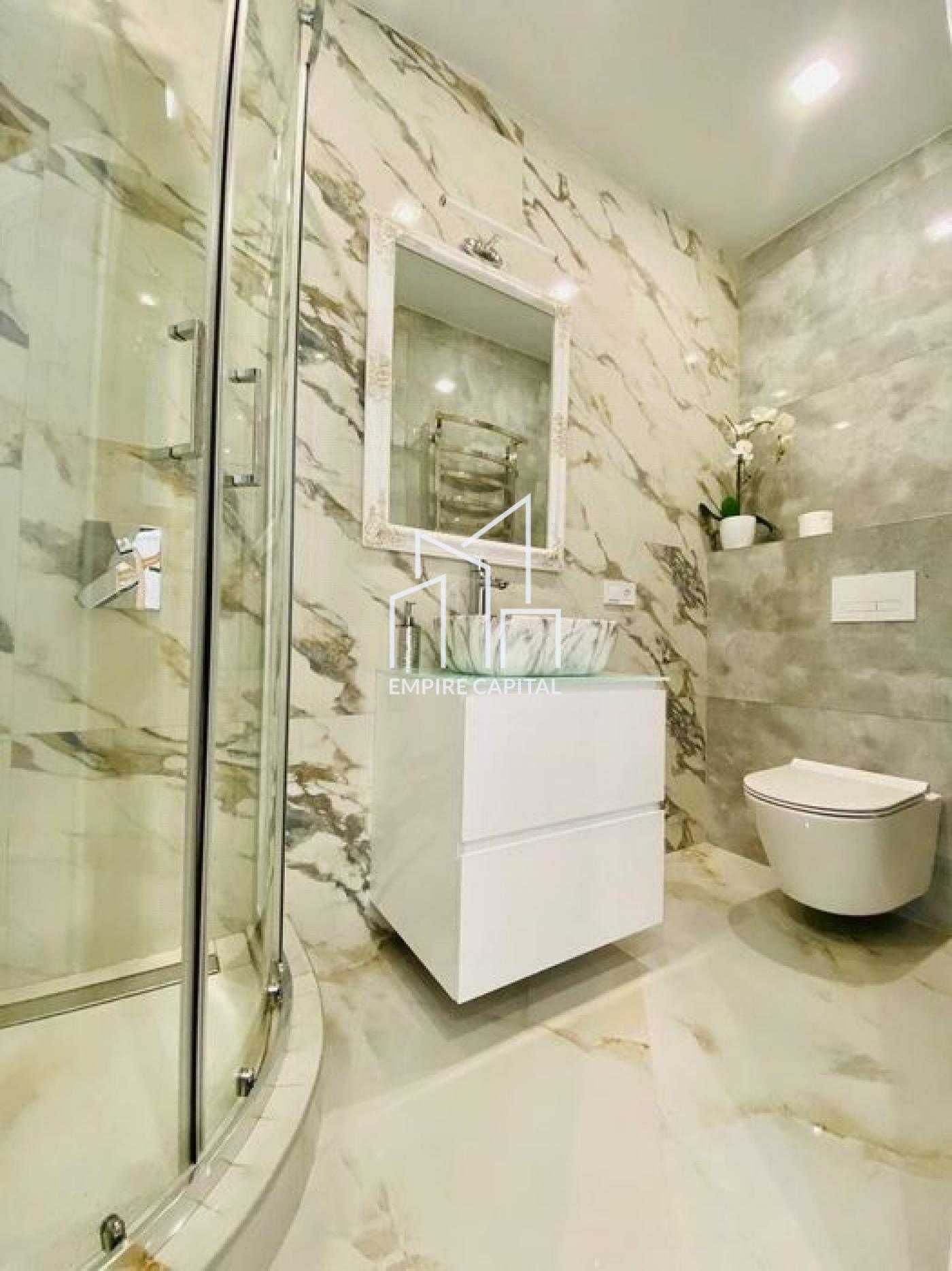 Two-level apartment in Avalon Flex complex with designer renovation