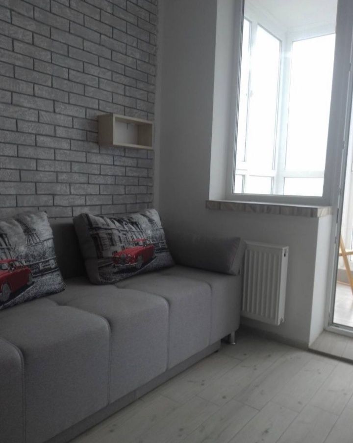 Comfortable one-bedroom apartment with studio kitchen and separate bedroom