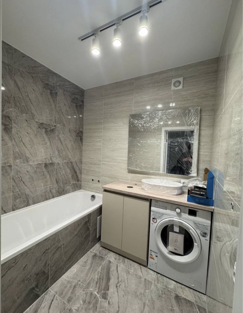 Modern Apartment with Designer Renovation and Full Amenities