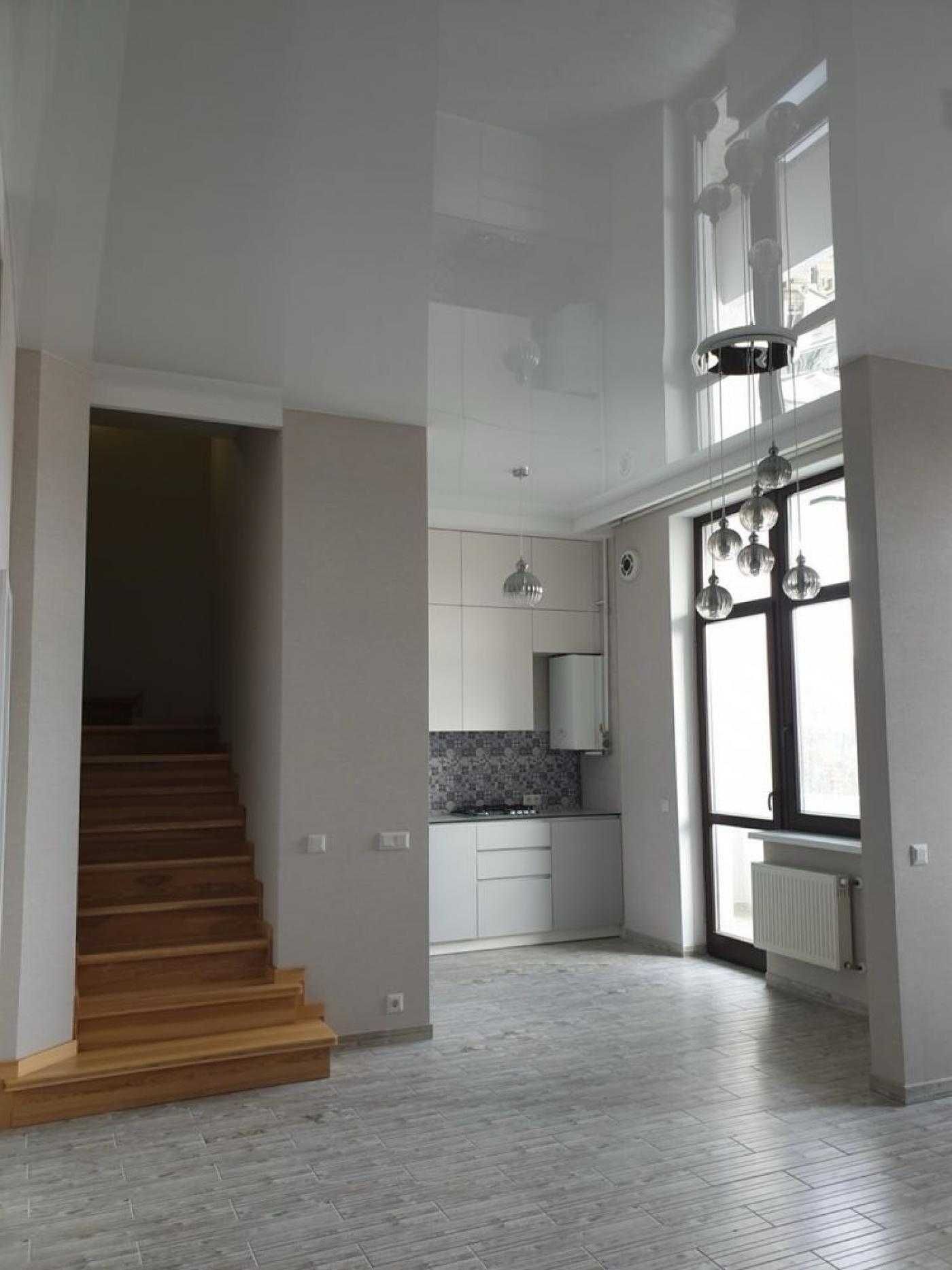 Modern Two-Level Apartment with Premium Renovation