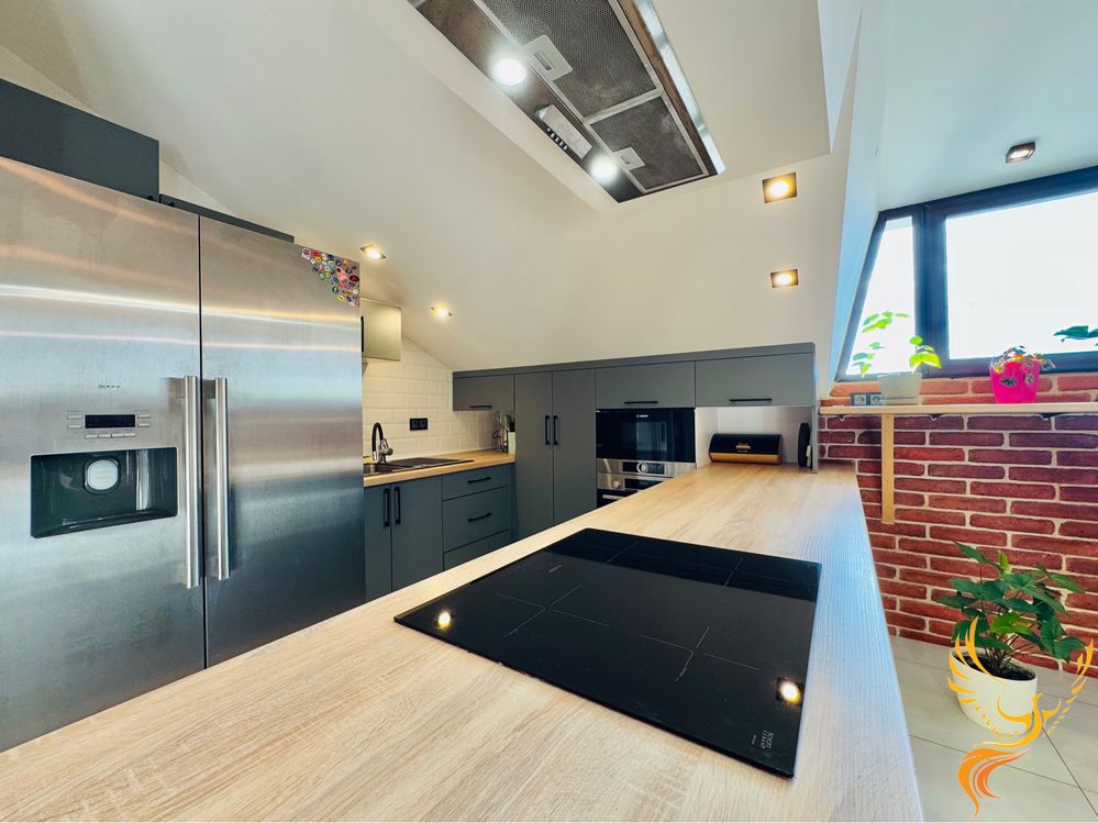 Two-Level Downtown Apartment with Designer Interior