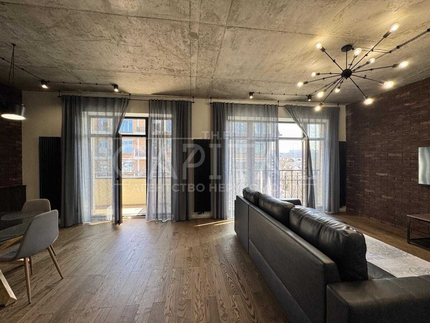 Designer Loft Apartment with Underground Parking in Podil