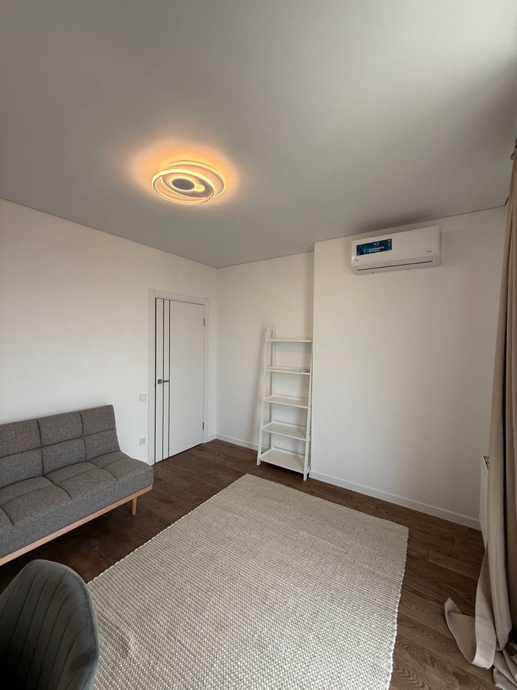 Two-level 2-room apartment with large kitchen-living room in Safe Town Complex