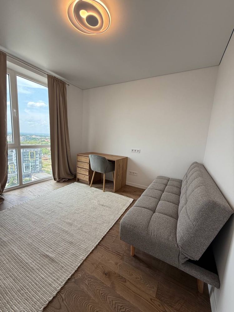 Two-level 2-room apartment with large kitchen-living room in Safe Town Complex