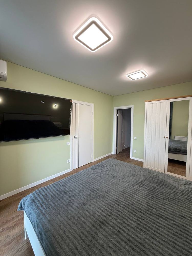 Two-level 2-room apartment with large kitchen-living room in Safe Town Complex
