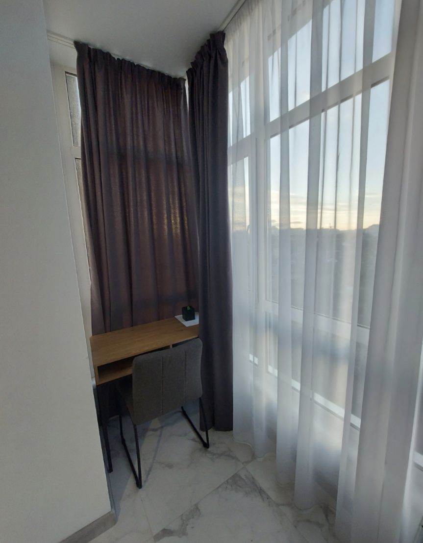 Stylish 1-Bedroom Apartment with 2-Bedroom Functionality in City Center