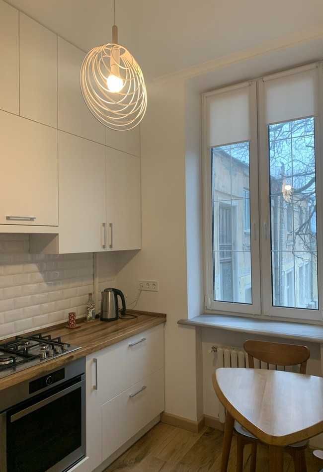 2-Room Apartment in Brick House with Modern Renovation and Built-in Furniture
