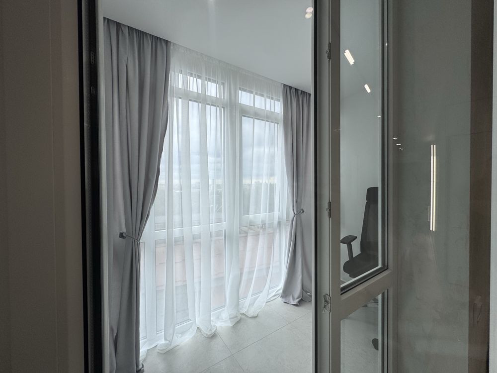 Modern 1-bedroom apartment with studio kitchen near city center