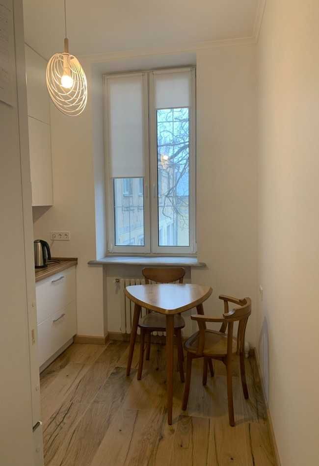 2-Room Apartment in Brick House with Modern Renovation and Built-in Furniture