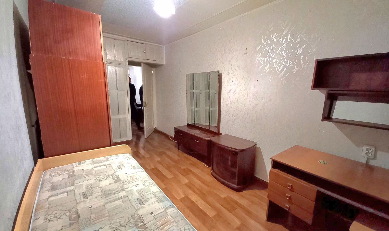 Furnished apartment with separate rooms and appliances