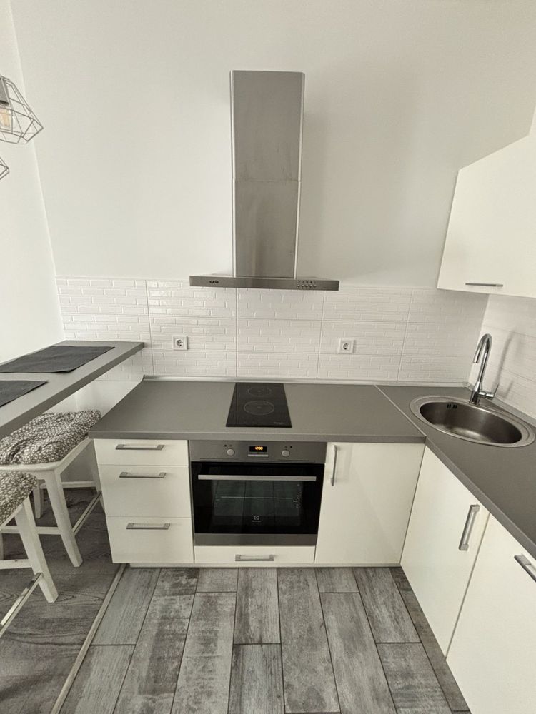 One-bedroom apartment with separate bedroom and spacious kitchen-studio