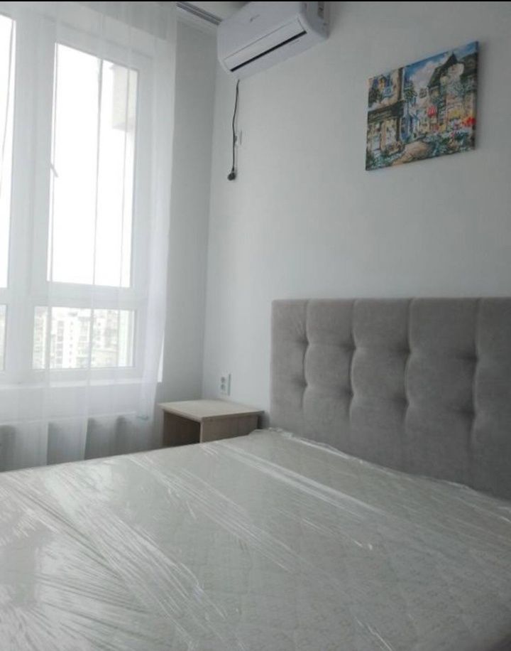 Comfortable one-bedroom apartment with studio kitchen and separate bedroom
