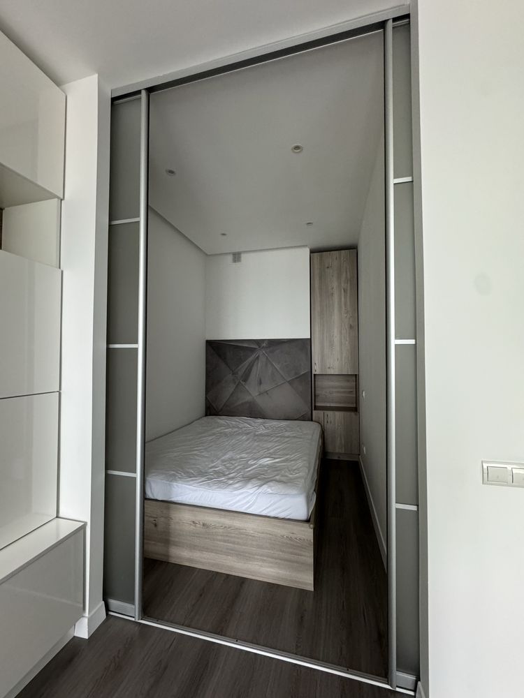 One-bedroom studio apartment with separate sleeping area
