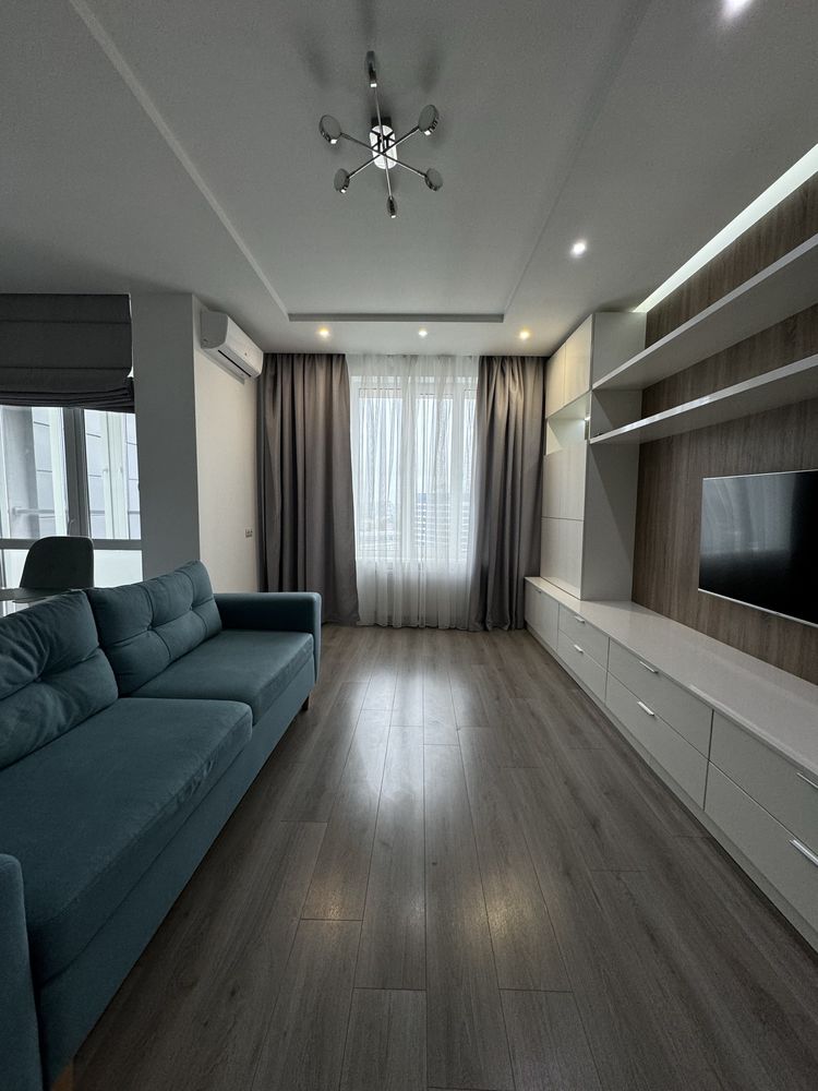 One-bedroom studio apartment with separate sleeping area