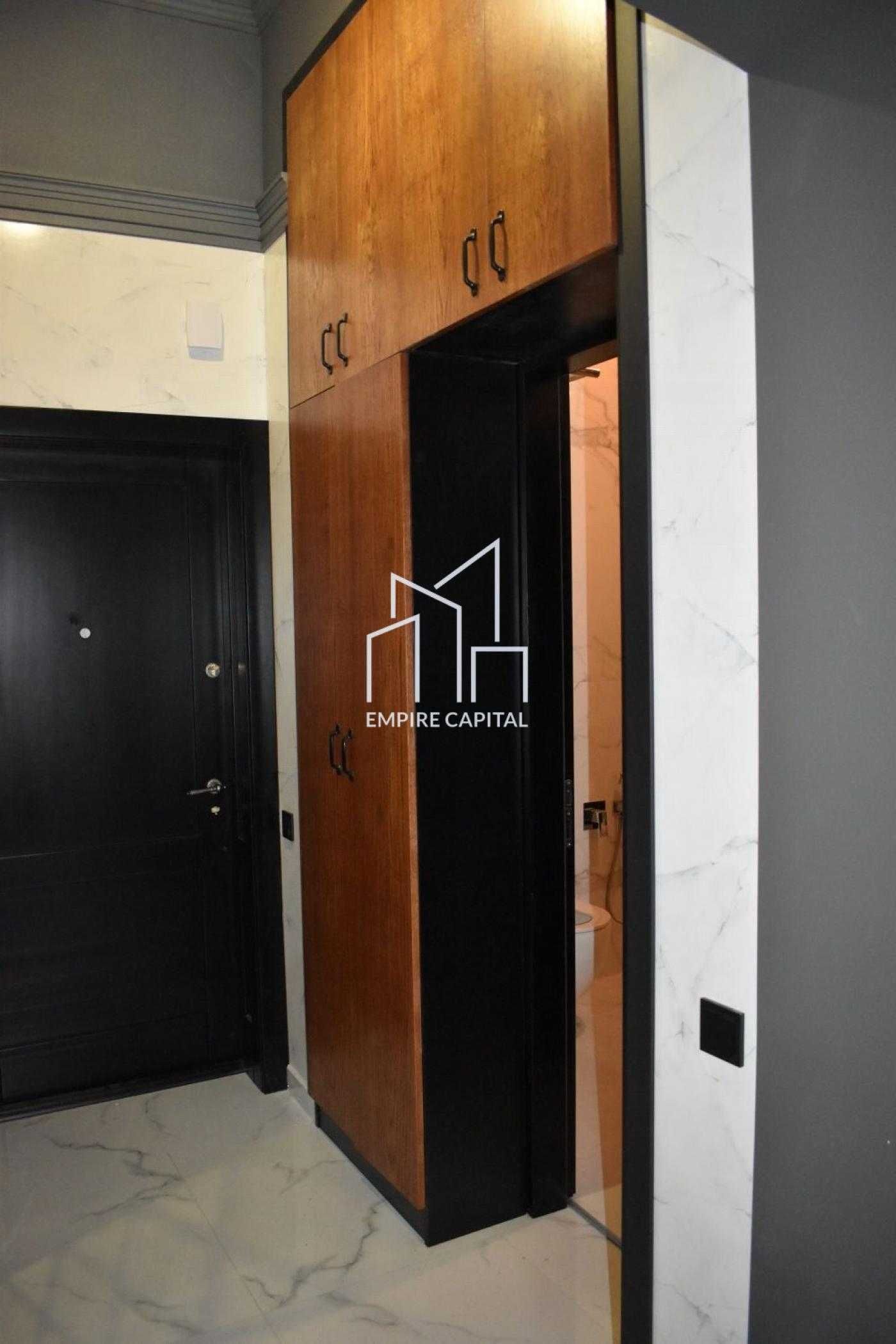 Опера театрының жанындағы дизайнерлік жөндеумен 2-бөлмелі пәтер