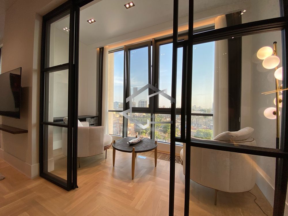Luxury 2-Bedroom Apartment with Panoramic Windows in Chkalov Tower Complex