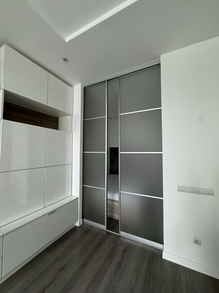 One-bedroom studio apartment with separate sleeping area