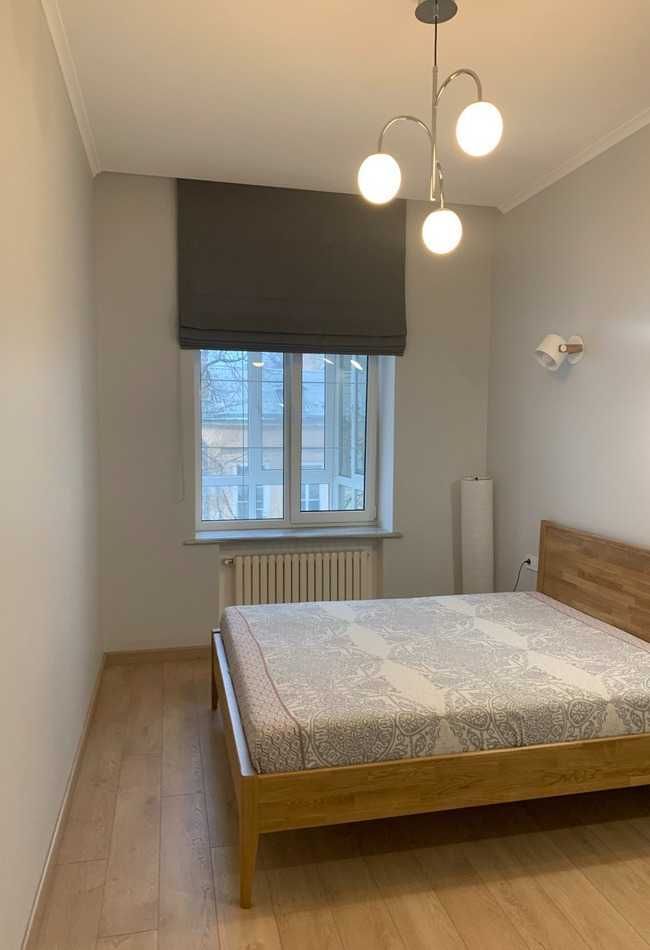 2-Room Apartment in Brick House with Modern Renovation and Built-in Furniture