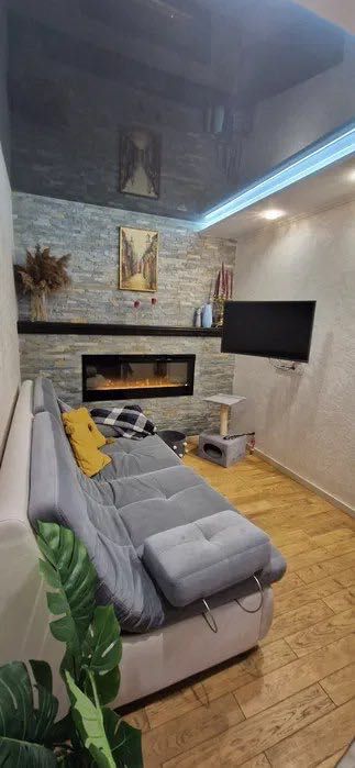 Two-level apartment with separate bedrooms and modern design