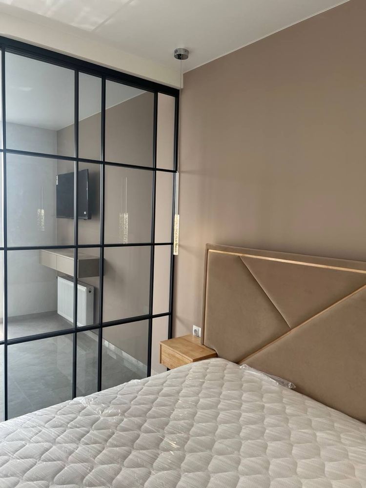 Modern Studio Apartment with Panoramic Windows and Full Amenities