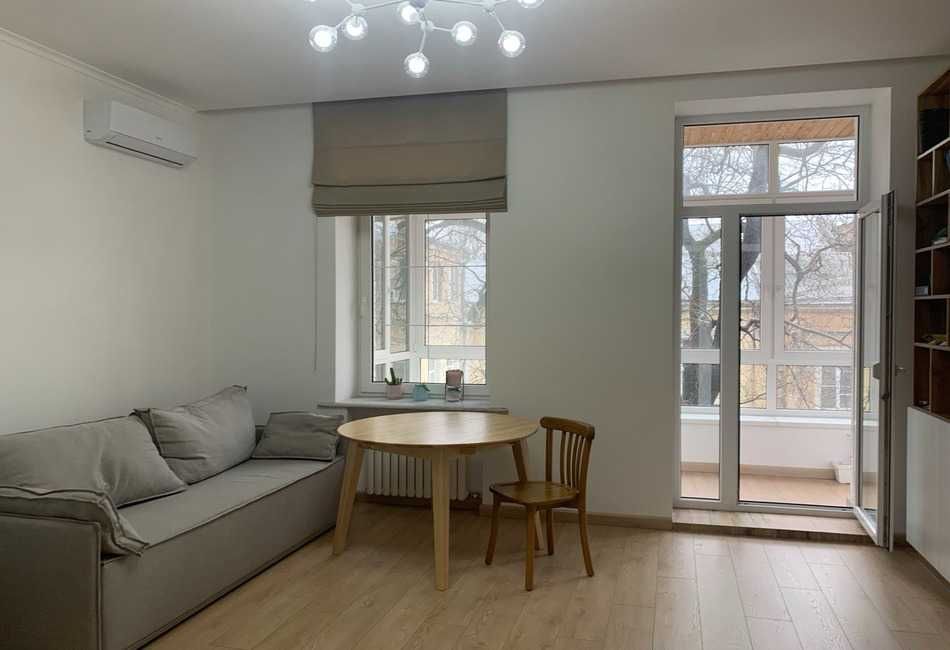 2-Room Apartment in Brick House with Modern Renovation and Built-in Furniture