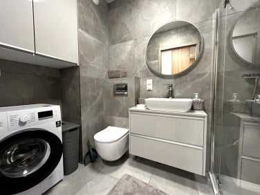 Spacious 1-Bedroom Apartment with Studio Kitchen in New Building