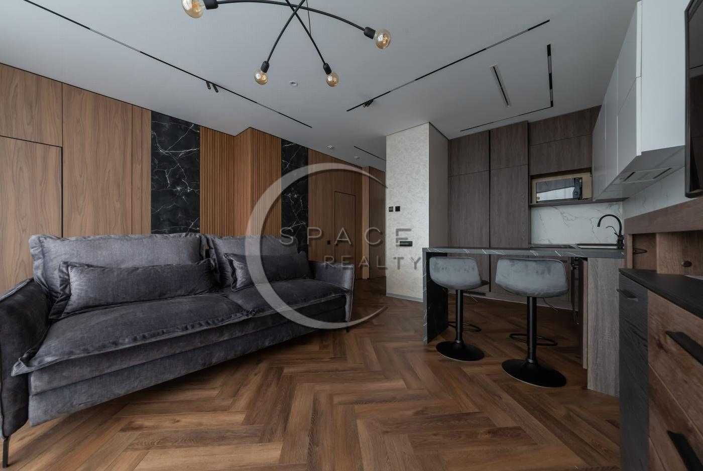 Modern Minimalist Apartment with Wooden and Marble Accents