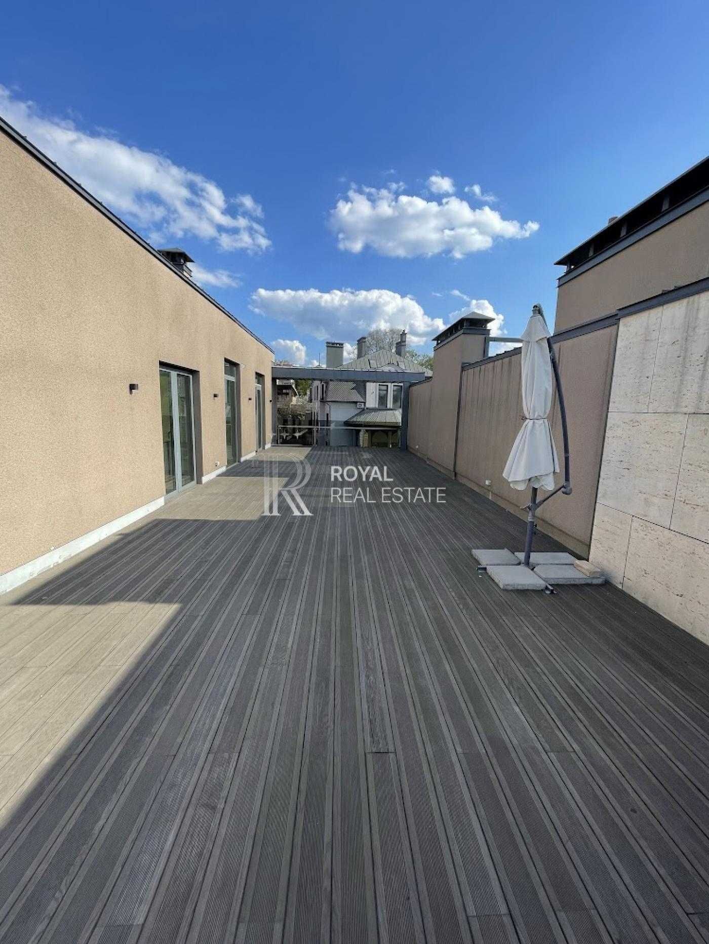 Luxurious Two-Level Penthouse with Private Terraces