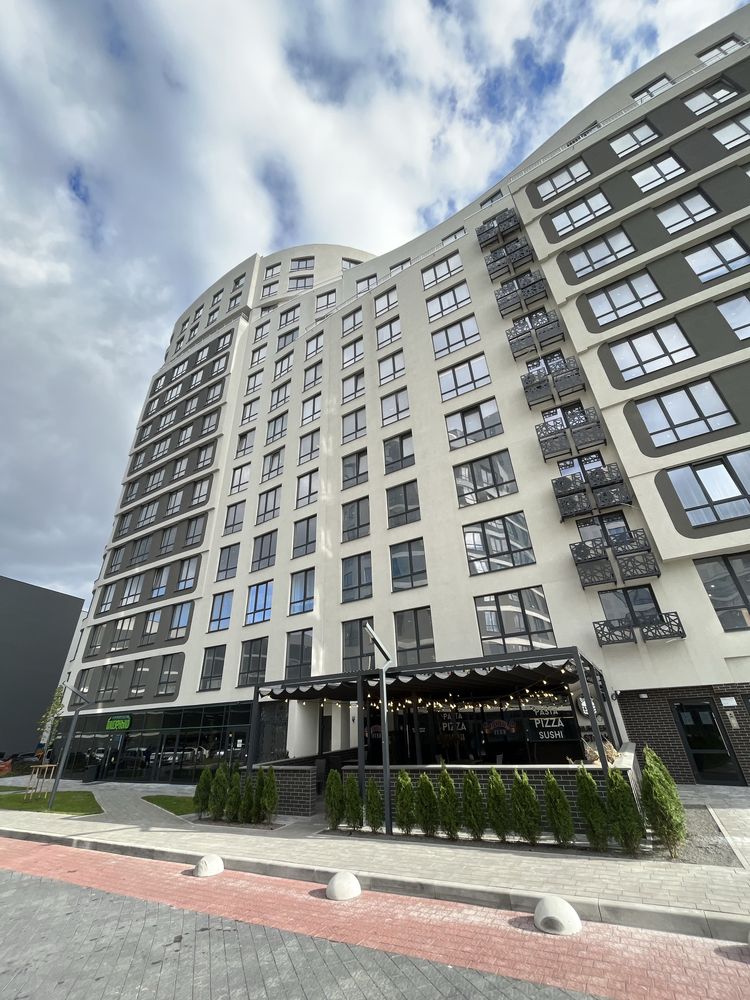 Spacious 2-room apartment with kitchen studio in Parus City complex