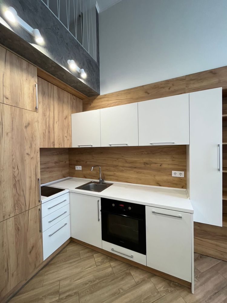 Modern Two-Level Apartment with Designer Renovation