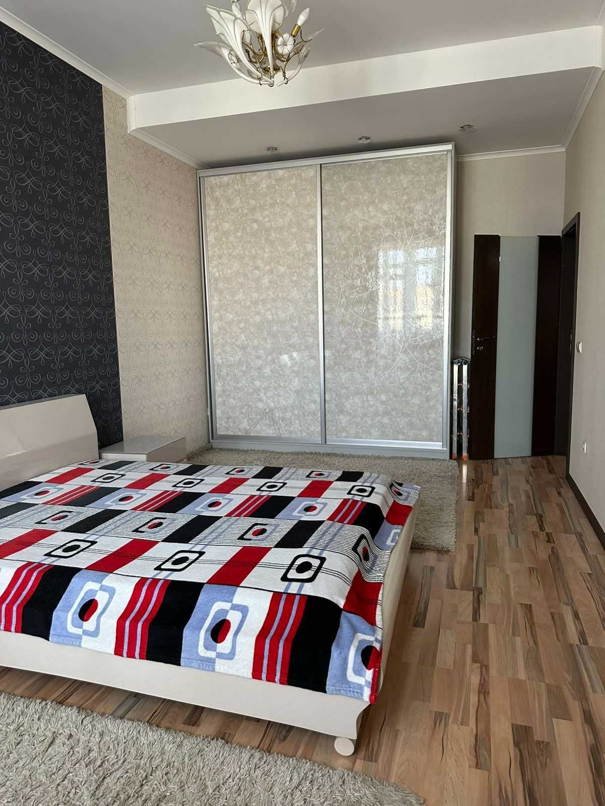 Spacious 2-bedroom apartment with high ceilings in a luxury building