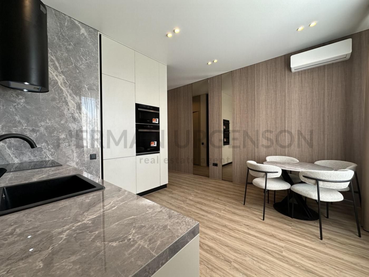 Central City Apartment with Designer Renovation and Modern Amenities