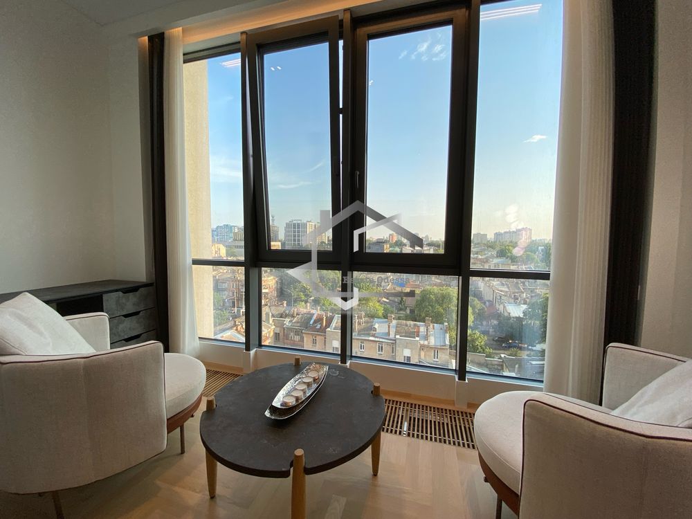 Luxury 2-Bedroom Apartment with Panoramic Windows in Chkalov Tower Complex