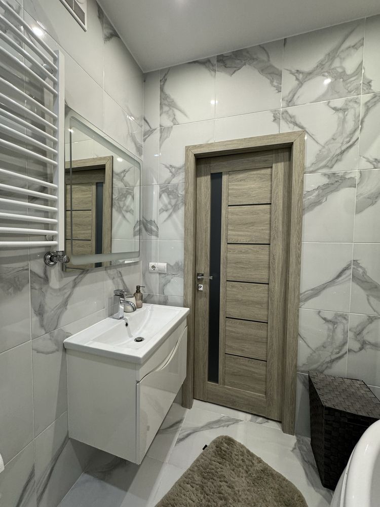 One-bedroom studio apartment with separate sleeping area