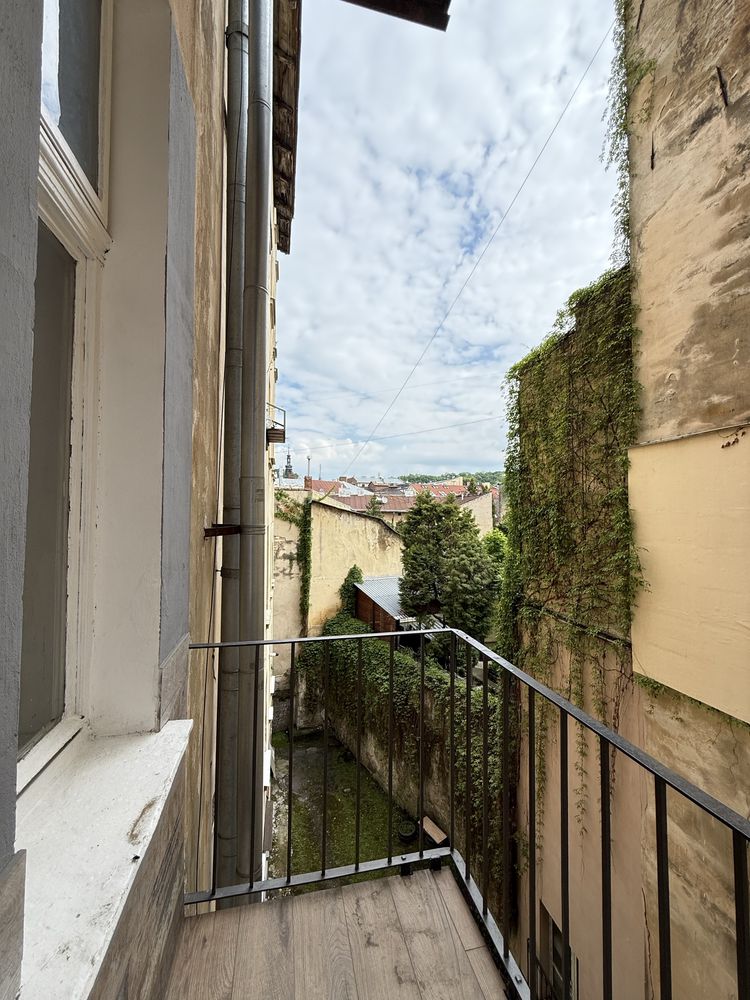 Spacious 3-Room Apartment in Historic Lviv Center with Authentic Austrian Building Features