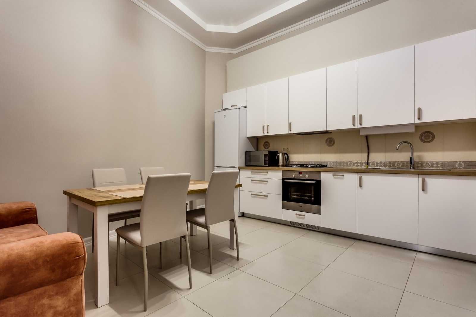 Two-room apartment in city center with designer renovation