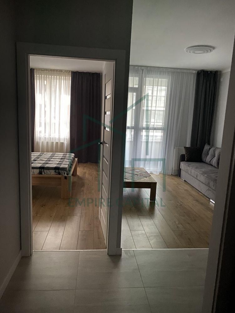 Modern 1-Bedroom Apartment with Oak Furniture
