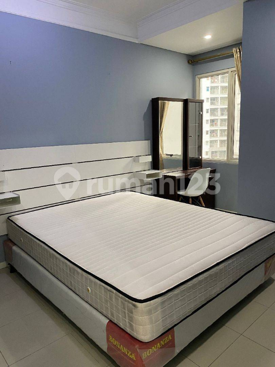 Furnished Two-Bedroom Apartment with Pool View