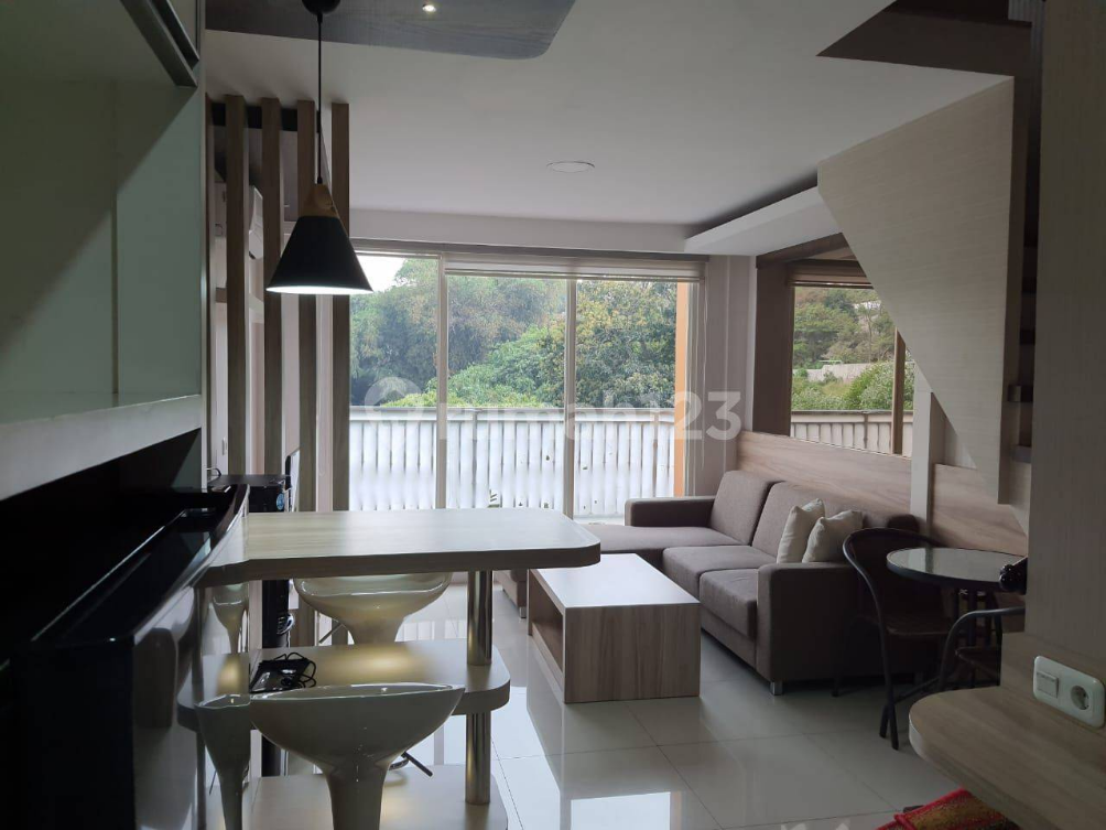 Furnished Loft Apartment with Balcony View