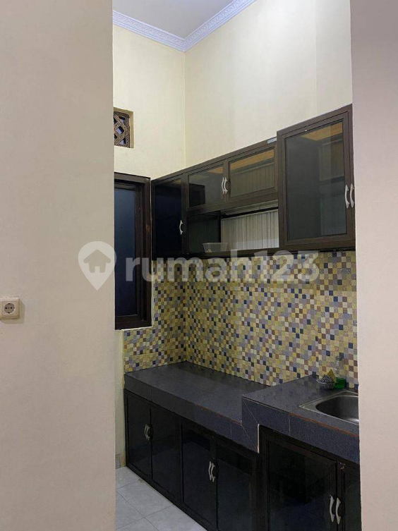 Four-Story Jelambar House with Two Bedrooms