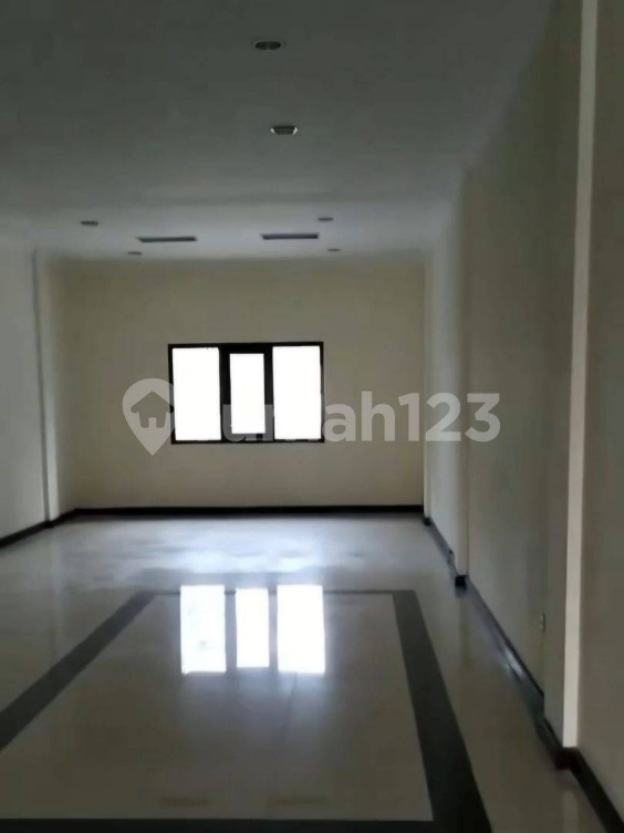 Spacious 4-Floor Commercial Building on Darmo Street