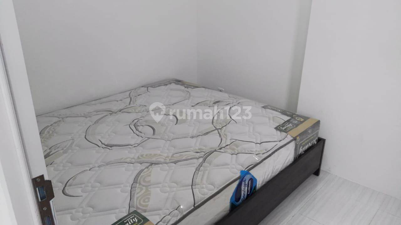 Semi-furnished 2BR Apartment near Pakuwon Mall