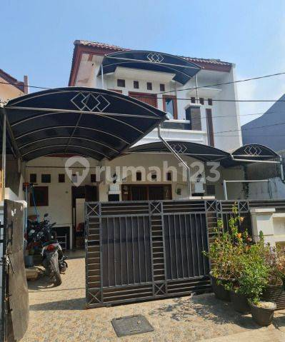 Modern Two-Story House with Garden and Parking