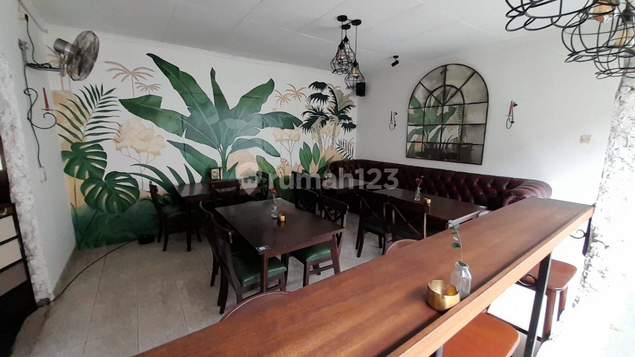 Spacious Two-Story Commercial Space with Cafe Setup