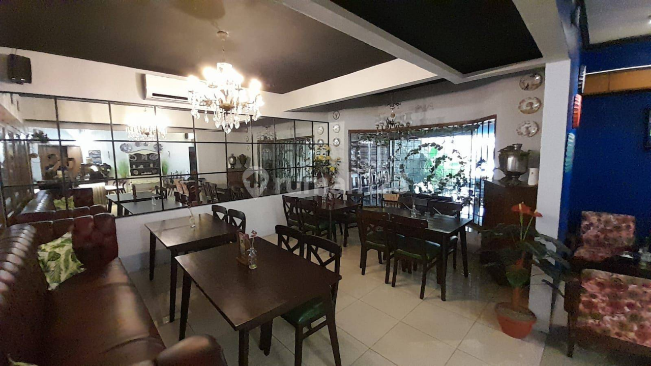 Spacious Two-Story Commercial Space with Cafe Setup