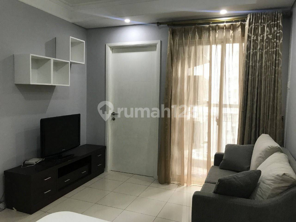 Furnished Two-Bedroom Apartment with Pool View